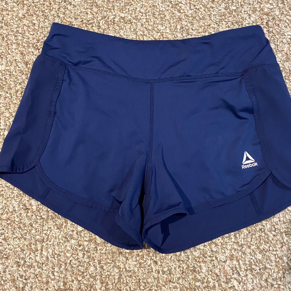 BRAND NEW navy blue reebok running shorts